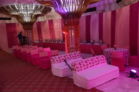 Guest seating and sofas beside a buffet counter